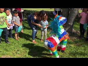 Birthday in three hitting piñata