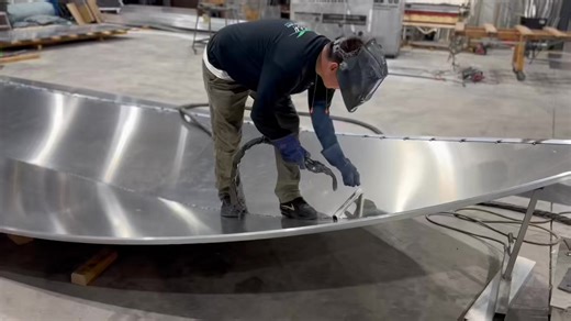 1.4K views · 24 reactions | We hit a milestone today. With the side transoms installed, she’s officially taking shape — that’s the moment every builder loves. From flat sheets to full form, it’s where the vision starts looking real. There’s still a lot of detail to go, but she’s already got that DTech stance. #boatbuilder #metalfabrication #customiseddesign #boatbuilders #weldinglife | D-Tech Custom Aluminum Boats | Facebook