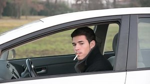 Handsome Young Man Smoking Cigarette While Stock Footage Video (100% Royalty-free) 14623813 | Shutterstock
