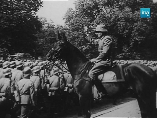 PARIS VILLE OUVERTE. Le 14 juin 1940, les Allemands défilent dans les rues de Paris. C’est le début de quatre longues années d’occupation. | INA madelen