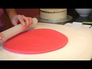 Covering A Cake With Sugarpaste - Cake Craft World Video 3