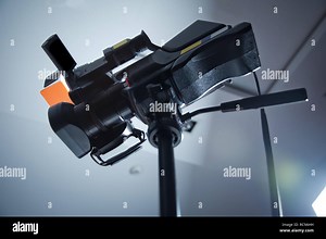 Camera recording publicity event . Press conference. Filming an event with a video camera.Professional digital Mirrorless camera with microphone on the tripod recording video Stock Photo - Alamy