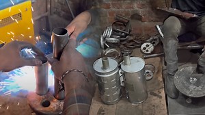 How Metal Sheets Become Car Exhaust Mufflers