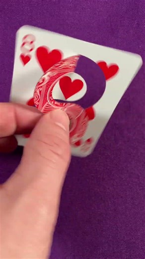 Another impossible seeming card fold. S is connected too and bottom. Kirigami