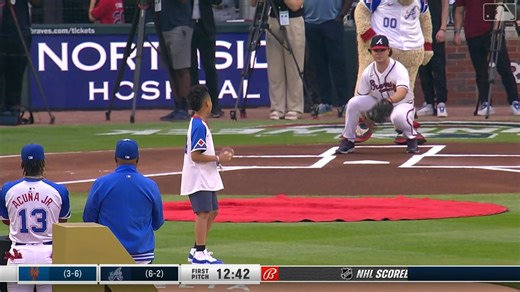 On the 50th anniversary of Hank Aaron's 715th home run, his great-grandson, King Aaron, tosses out the first pitch! ❤️ | MLB