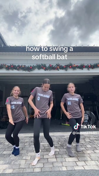 how to swing a softball bat