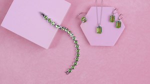 5.4K views · 39 reactions | We could get all serious about the beauty and symbolism of this perfect shade of green … with its uncanny ability to inspire creativity and good cheer. But, in truth - this burst of effervescent color is so much fun! https://touchstonecrystal.biz/peridot #peridotjewelry #springcollection #Jewelry #summerjewels | Touchstone Crystal | Facebook
