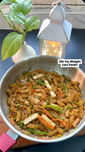 Easy High-Protein Stir Fry Pasta — loaded with fresh veggies, paneer, and whole wheat pasta. Quick, filling, and weight-loss friendly! 💪 🌿 Ingredients (Veggie Protein): Whole wheat pasta, paneer/chana, capsicum, beans, broccoli, carrot, sweet corn, garlic, green chilli, olive oil For the Sauce (The Star of the Dish!): 1/2 tsp olive oil 1 tsp honey or jaggery 1/2 tsp sesame seeds 1/4 tsp soy sauce 1-2 tsp vinegar 1/2 tsp schezwan sauce Oregano Chilli flakes Salt to taste (Mix everything well an