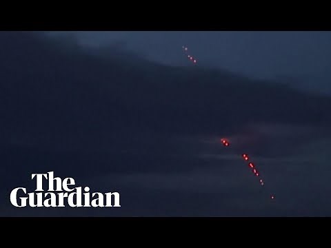 Ukraine air defence tracer fire targeting Russian missiles lights up Kyiv sky