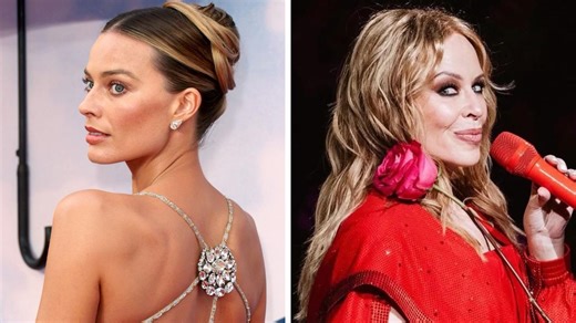 Margot Robbie wows in plunging see-through gown