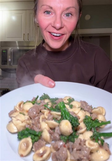 Sausage and Broccolini Orecchiette 1 pound orecchiette 5 tablespoons extra virgin olive oil, divided 1 pound Italian sausage, removed from casings 4-6 grlic cloves, minced 1 cup pasta water 2 cups broccoli florets, roughly chopped ½ teaspoon salt ¼ teaspoon red pepper flakes 3 tablespoons unsalted butter lemon zest and about 2 TBSP lemon juice ½ cup freshly grated parmesan cheese Bring a large pot of salted water to a boil. Add the orecchiette and cook 1 minute less than package instructions to 