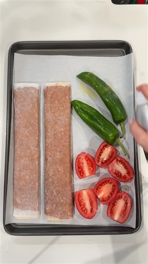 MARIAM | Cookin’ with Mima on Instagram: "I made the viral döner kebab with a little Lebanese twist and it did not disappoint! Save and share with a friend you want to try it with! RECIPE: 1 ground beef 85/15 1/2 onion 1 tablespoon yogurt (full normal spoon) 1 teaspoon paprika 1 teaspoon black pepper 1 tablespoon red pepper paste 1 teaspoon paprika 1/2 teaspoon cumin 1/2 tsp 7 spice or shawarma spice 1 teaspoon salt Toppings Grilled veggies Shata sauce (spicy harisa sauce) Tahini sauce Sumac oni