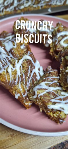 Crunchy Biscuits Recipe: 1 cup oats 1 cup sugar 1 cup coconut 1 cup flour 1 tsp coffee 1/2 tsp cinnamon 125gr butter 4 tblsp honey or golden syrup 1 tsp bicarb Mix everything together except the butter honey and bicarb. Add the honey butter & bicarb to a pot and melt butter. Then add butter mixture to the flour mixture. Bake at 160 degrees for 20 to 25 min depending on your oven. Enjoy! #biscuits #baking #oats #crunchy