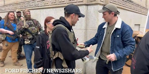 Gun activists hand out AR-15 magazines at Capitol to defy upcoming ban