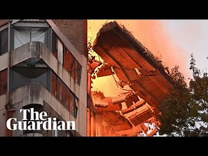 Walls collapse after massive fire engulfs building in Sydney – video