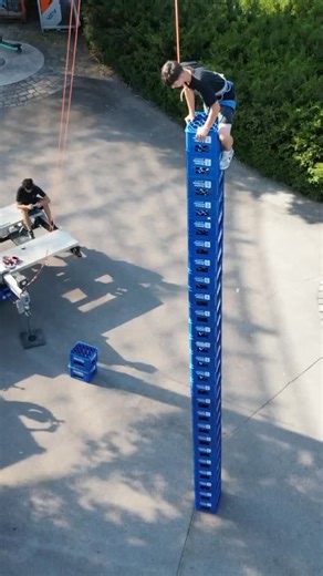 Weiifei 🛜 | Crate climbing is one of the wildest balance challenges out there. Competitors stack and climb plastic crates as high as they can while... | Instagram