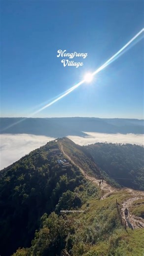 At Nongjrong, the world sits below you. The clouds move like waves, the sun rises slow, and everything suddenly feels peaceful.❤️🌅 Follow for more such content. #meghalaya #explore #travel #northeast #sunrise | MeghalayaTrails
