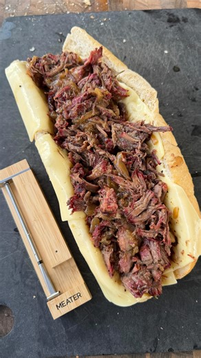 SMOKED PULLED BEEF SANDWICHES @meatermade Smoked a 3–5 lb chuck roast at 275°F using the MEATER Pro Pulled at 165°F, then braised with onions, herbs, beef stock & butter Finished at 205–210°F until fall-apart tender Shred it up and serve on hoagies with provolone au jus 🤌 Chuck roast is perfect for sandwiches, tacos, burritos, bowls—whatever you’re craving | Miguels cookingwithfire