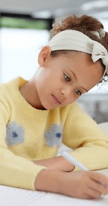 Kid, thinking and idea for homework, study and learning for growth and development. Girl, pen and worksheet for education, childhood and writing in kitchen or living room for home or remote schooling