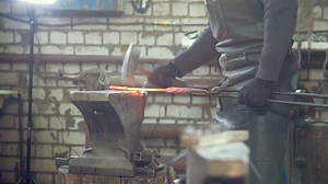 Muscular Man Blacksmith With Hammer In Forge Stock Footage SBV-322578588 - Storyblocks