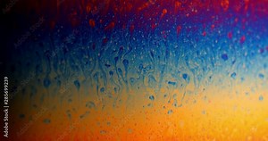 Macro shot: Surface of the soap film and the movement of rainbow streaks due to diffraction and interference of light. 4k. Slow motion Stock Video