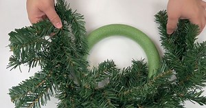 How to Craft a Christmas Candle Wreath Centerpiece on a Budget
