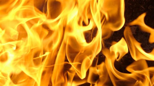 East Grand Forks fire crews battle garage fire in blizzard