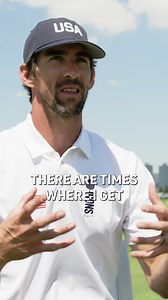 Using an Olympic gold medal as a ball marker … ultimate flex from Michael Phelps. | GOLF.com