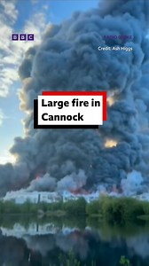 Businesses near a large fire in Staffordshire have been urged to evacuate as dozens of firefighters tackle the blaze. Ten fire engines were sent to a "very large scale" blaze close to the Orbital Retail Park in Cannock, Staffordshire. | BBC Stoke & Staffordshire