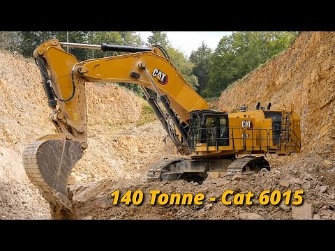 Massive 140-Tonne Cat 6015 Excavator at Work in Limestone Quarry