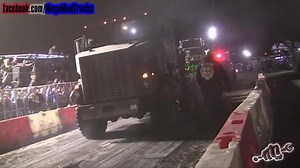 It took THREE obscenely large trucks to drag this 8-wheel drive military hauler! Watch the full video https://goo.gl/hkUv2Y | Mega Mud Trucks