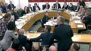 Murdoch attacked at phone hacking hearing