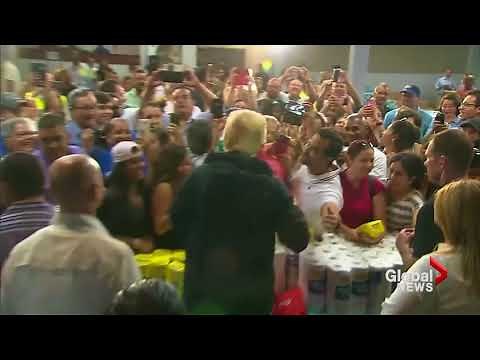 Donald Trump throws paper towels into crowd at Puerto Rico relief center