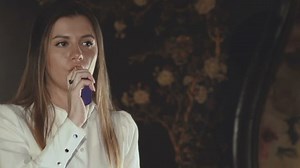 clip-1017048241-passionate-lady-smoking-e-cigarette-breathing-out-on