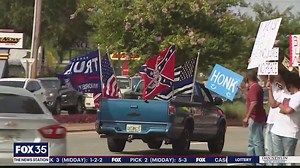 Protesters take opposite corners in New Smyrna Beach intersection