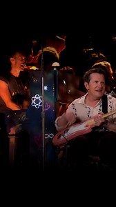 558K views · 9.1K reactions | Tête d'affiche du Festival de Glastonbury ce week-end, le groupe Coldplay a surpris ses quelque 100 000 spectateurs en faisant monter sur scène l'acteur Michael J. Fox. Et comme dirait Marty McFly : "Ça c'est du Rock !" #RetourVersLeFutur #coldplay #glastonbury | HERO | Facebook