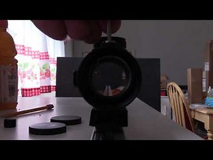 Test setup of Astromania 1X40RD sight; showstracking dot movement when adjusting sight alignment.