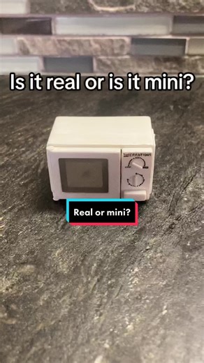 Is it real or is it miniature? It’s mini! This microwave is phenomenal: there is a button that opens the door and the light automatically comes on, there’s a tiny tray on the inside, and when you shut the door, the light turns off! I swoon over this mini and can’t wait to start work on my mini kitchen! Have you ever seen a tiny microwave this neat?!? #miniature #miniatures #dollhouse #112scale #112scaleminiatures #realormini #dollhousetiktok