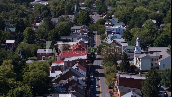 Explore the beauty of Shepherdstown, West Virginia, with vibrant autumn colors and scenic architecture, showcasing its historic charm and natural landscape.