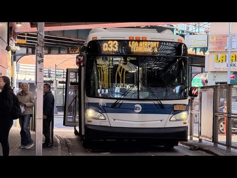 MTA Bus #7375 (Ex-CS) on the Q33 to Jackson Heights approaching the 74th St Bus Terminal
