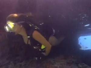 Woman scuba diver diving in Bimini 1990s