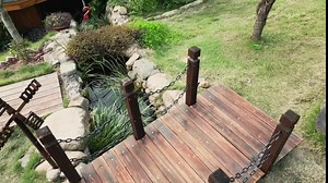 AHB 5FT Garden Bridge, Wooden Arc Bridge for Outdoors with Safety Railings Windmill, Stained Finished Wood Decorative Pond Bridge for Backyard Cream Farm (Wood)