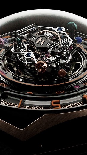 Welcome to the HYT CONICAL TOURBILLON INFINITY SAPPHIRES watch. Combining animations, sparkling gemstones and the complications of a groundbreaking never-before-seen conical tourbillon with HYT’s exclusive fluidic mechanical technology. The chaotic animation is nestled around the conical tourbillon is composed of 3 exceptional faceted sapphires, each 2.5mm in diameter. Elevating the tourbillon’s visual impact, 6 smaller sapphires, each 1.5mm in diameter, set in the tourbillon’s brackets. Stay tu