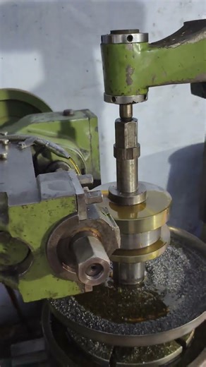 image displays a gear hobbing machine in operation, a the process.Would you like to know more about