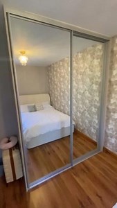 ✨ Transform your space with style and functionality! ✨ Check out this stunning mirrored sliding wardrobe – sleek, space-saving, and a perfect way to make any room feel bigger and brighter. Whether you're going for a modern vibe or just need that everyday mirror convenience, this wardrobe has it all. #SlidingWardrobe #MirroredWardrobe #InteriorGoals #HomeStorage #MadeToMeasure | Sliderobes UK