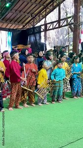 playing angklung. That is a multitonal musical instrument that developed from the Sundanese people