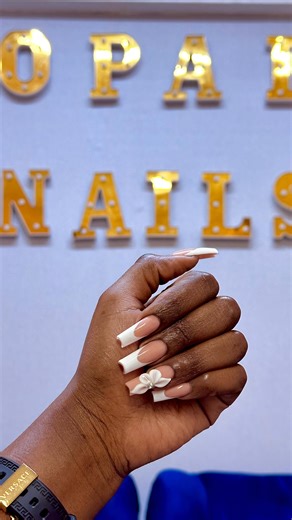 Sharon Otieno🇰🇪 on Instagram: "Nail day 💅🏾🌸💗 Got a Classic French set with a little twist, I am obsessed!🤩 @opal_nails_salon"
