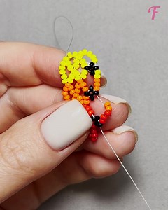 Artist's unique beadwork necklace elevates personal style. | Fabiosa Better World