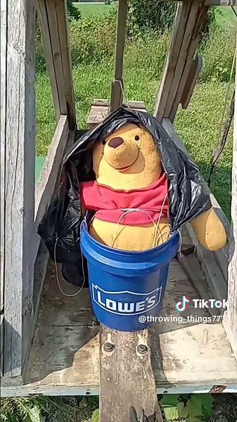Winnie tries to Parachute