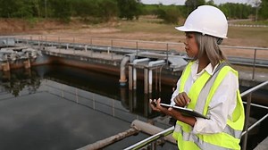 clip-1102387467-environmental-engineers-work-wastewater-treatment ...